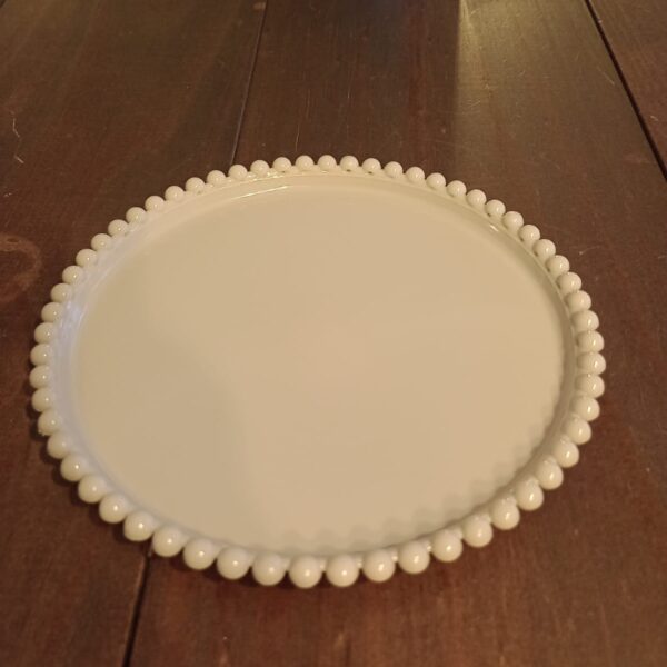 Bandeja acrílica bege redonda do Mercadão das Essências para decoração e organização