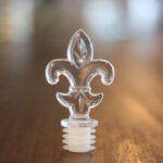 Tampa Acrílica Flor de Liz R28/410 transparente