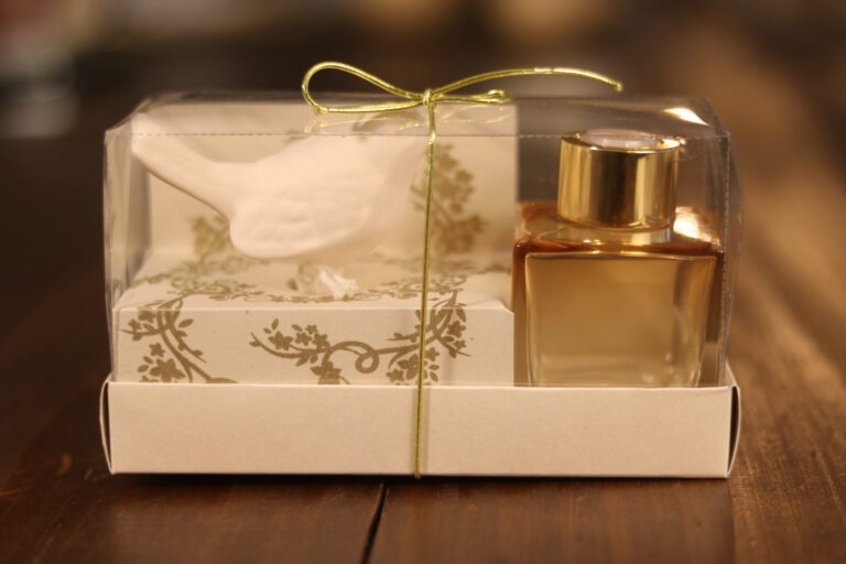 caixa aromatizador com frasco translucido e passarinho